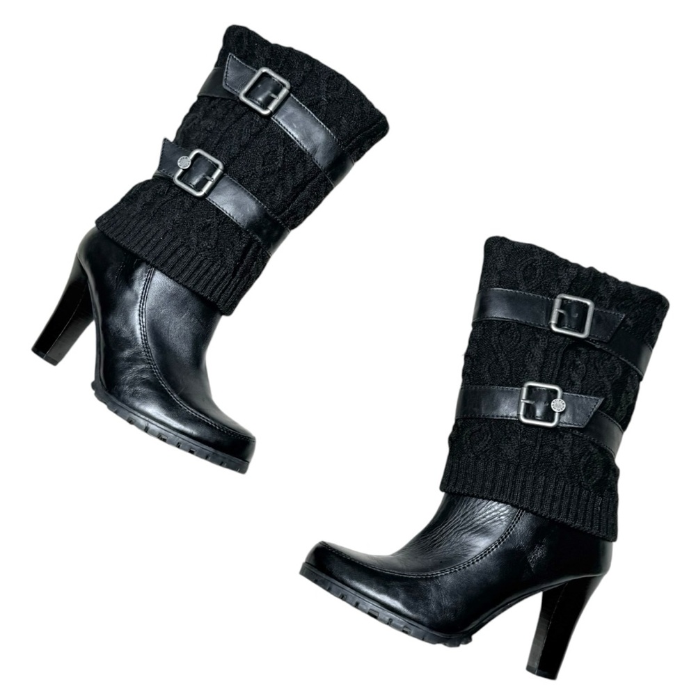 Black mid-calf chunky knit boots.
